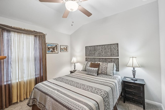 carpeted bedroom with ceiling fan and lofted ceiling