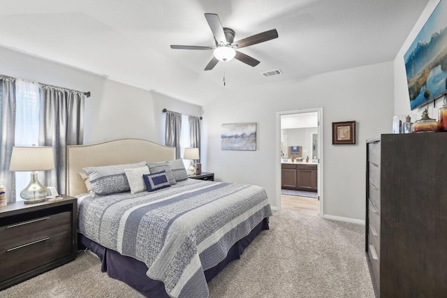 2912 Youngwood St, Leander, TX 78641 - bedroom with light carpet, ceiling fan, ensuite bath, multiple windows, and vaulted ceiling