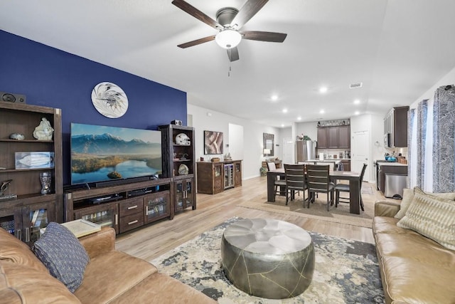 2912 Youngwood St, Leander, TX 78641 - living room featuring a ceiling fan, light wood-style flooring, and recessed lighting