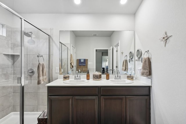 bathroom with vanity and walk in shower