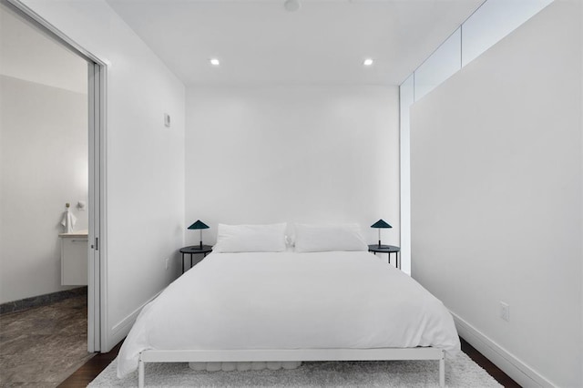 bedroom featuring dark wood-type flooring