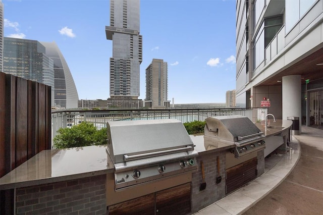 view of patio / terrace with area for grilling and exterior kitchen