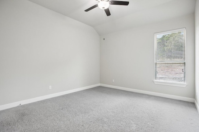 unfurnished room with carpet, ceiling fan, and lofted ceiling