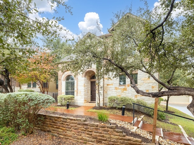 view of front facade featuring stone siding