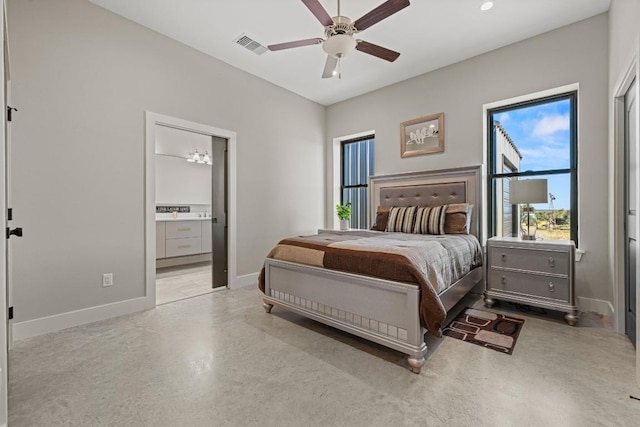 bedroom featuring ensuite bath and ceiling fan