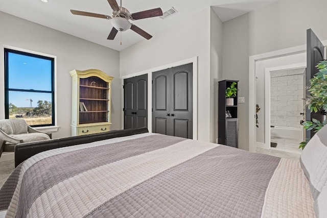 bedroom with connected bathroom and ceiling fan