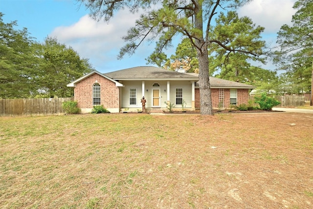 ranch-style house with a front lawn