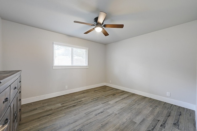 empty room featuring hardwood / wood-style floors