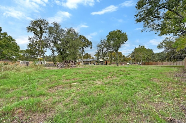 view of yard with a rural view