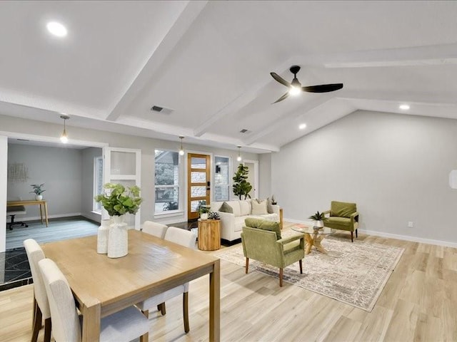 dining room with lofted ceiling with beams, ceiling fan, and light hardwood / wood-style floors