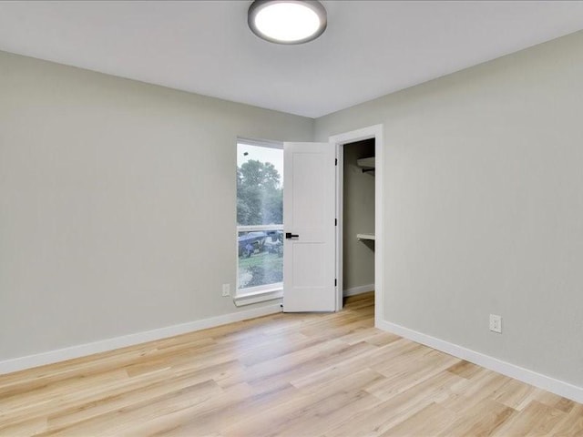 empty room featuring light hardwood / wood-style floors