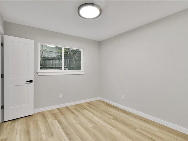 empty room featuring light hardwood / wood-style floors