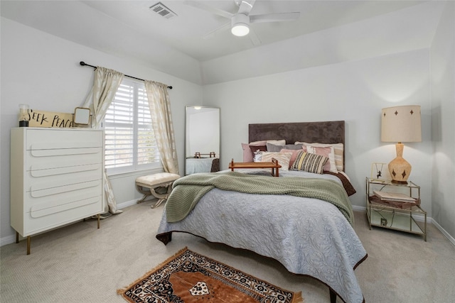 bedroom with light colored carpet and ceiling fan