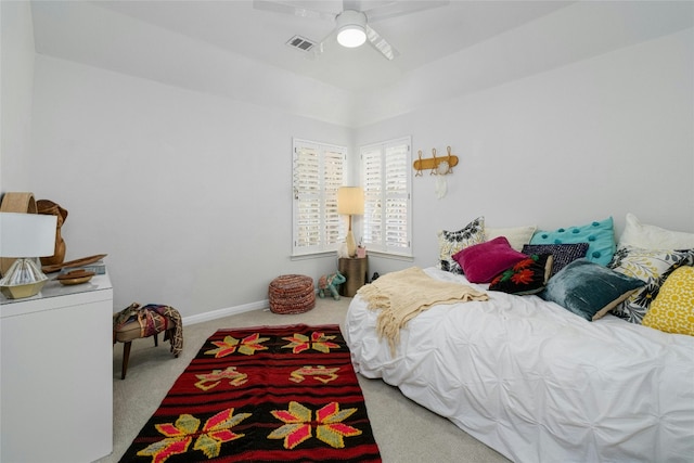 carpeted bedroom with ceiling fan