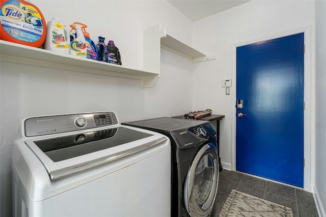 laundry area with washing machine and clothes dryer