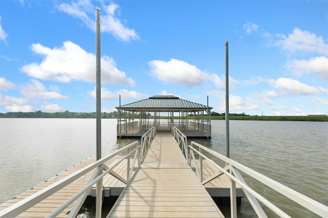 dock area with a water view and a gazebo