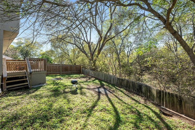 view of yard with a deck