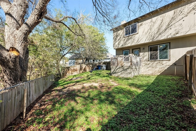 view of yard featuring a wooden deck