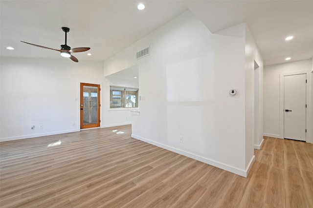 unfurnished living room with ceiling fan and light hardwood / wood-style floors