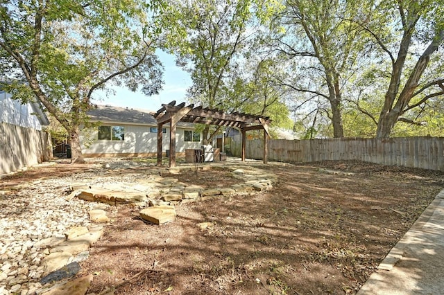 view of yard with a pergola