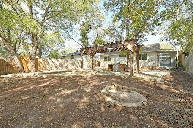 back of house with a pergola