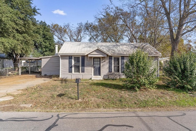 view of front of house with a carport