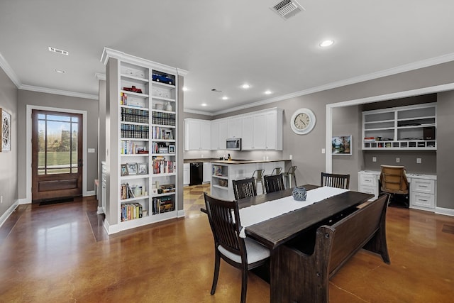 dining area featuring crown molding