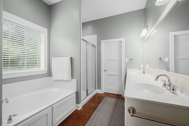 bathroom featuring separate shower and tub and vanity