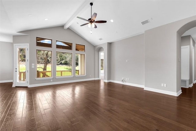 20701 Deep Crk, Lago Vista, TX 78645 - unfurnished living room with arched walkways, ceiling fan, beamed ceiling, dark wood finished floors, and baseboards