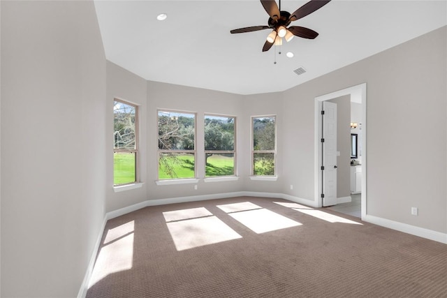20701 Deep Crk, Lago Vista, TX 78645 - carpeted spare room with baseboards, a ceiling fan, and recessed lighting