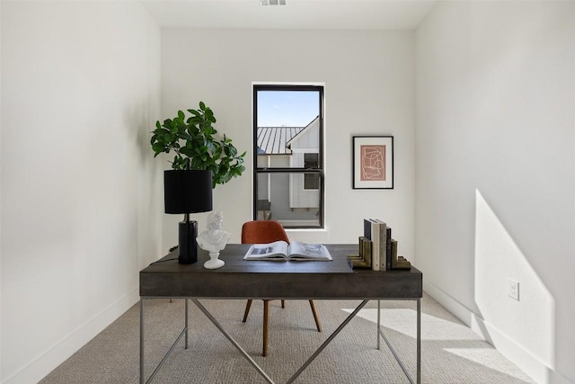 view of carpeted home office