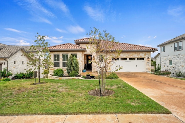 mediterranean / spanish-style home featuring a garage and a front yard