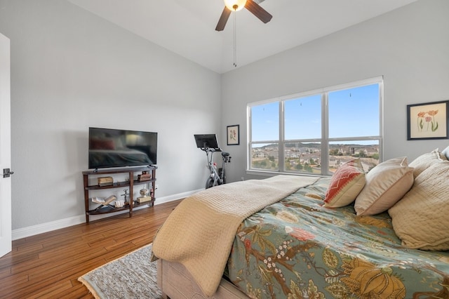 bedroom with hardwood / wood-style flooring and ceiling fan