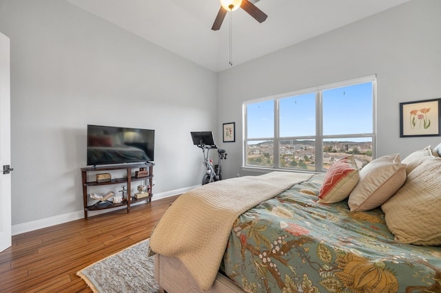 203 Serene Hilltop Cir, Lakeway, TX 78738 - bedroom featuring wood-type flooring, baseboards, and a ceiling fan