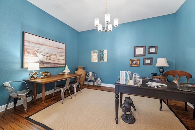 203 Serene Hilltop Cir, Lakeway, TX 78738 - office space featuring wood finished floors, baseboards, and a chandelier