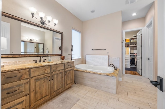 203 Serene Hilltop Cir, Lakeway, TX 78738 - full bath featuring a bath, vanity, and a walk in closet
