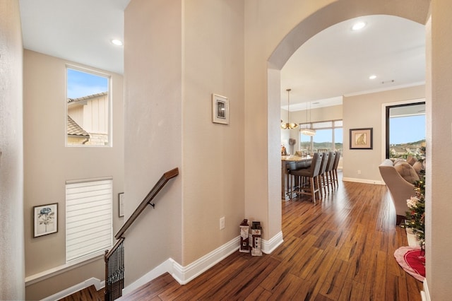 203 Serene Hilltop Cir, Lakeway, TX 78738 - corridor with arched walkways, dark wood finished floors, an upstairs landing, baseboards, and recessed lighting