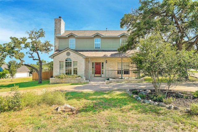 view of front of home with a front lawn