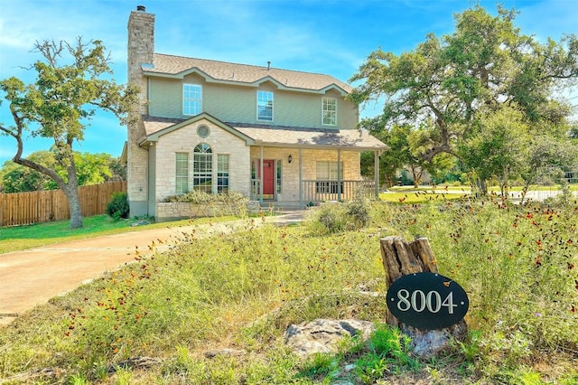 front of property featuring covered porch