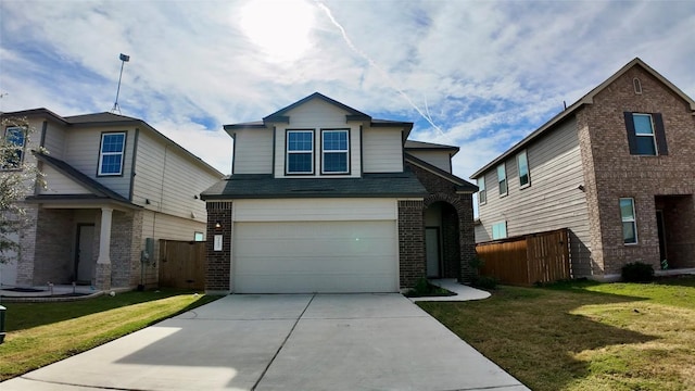 view of front of house with a front lawn and a garage