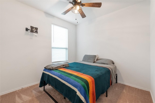 bedroom featuring ceiling fan and light colored carpet