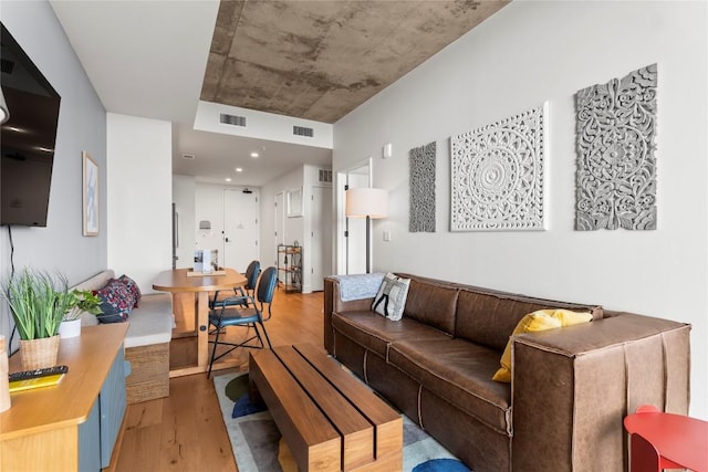 48 E Ave Unit 2506, Austin, TX 78701 - living area featuring light wood finished floors