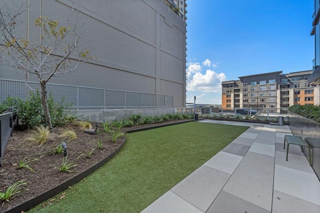 48 E Ave Unit 2506, Austin, TX 78701 - surrounding community with a patio area