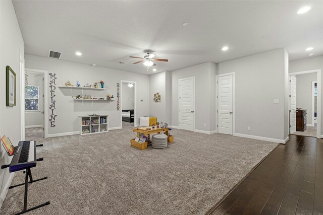 interior space featuring dark hardwood / wood-style flooring and ceiling fan