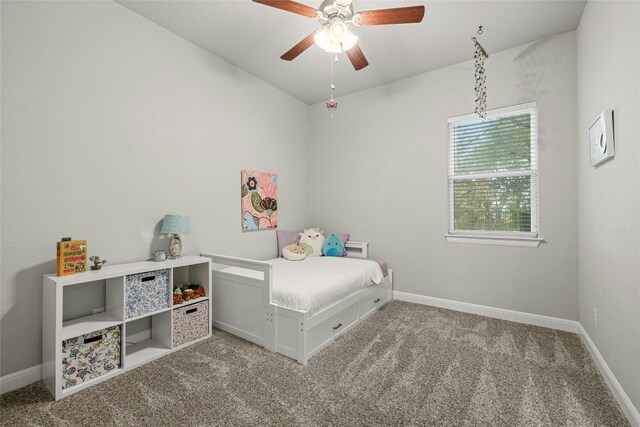 bedroom featuring light colored carpet and ceiling fan