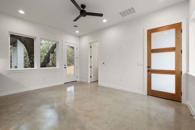 foyer entrance with ceiling fan