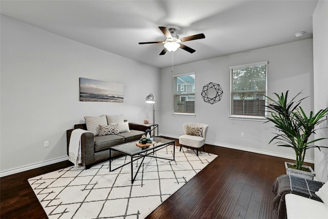 living room with ceiling fan and light wood-type flooring