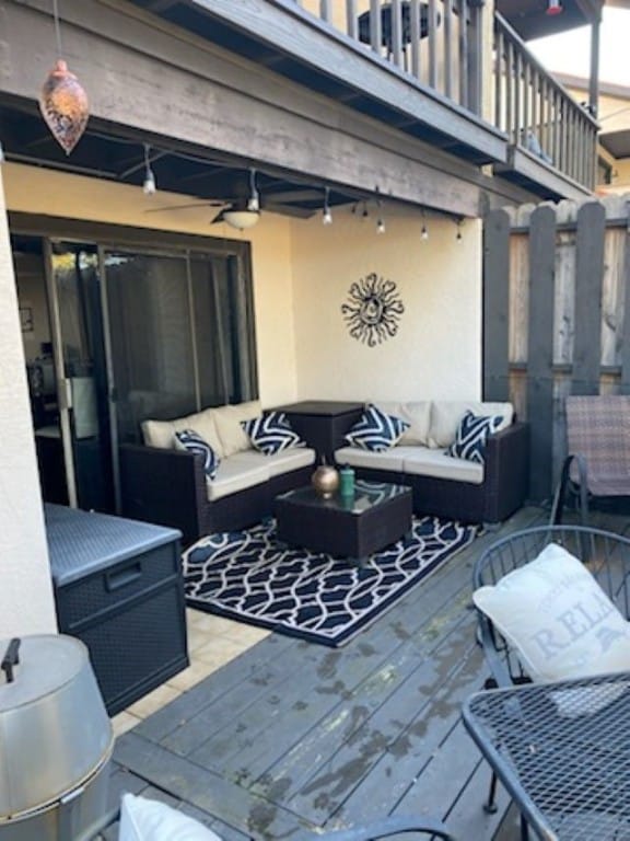 wooden deck featuring an outdoor living space