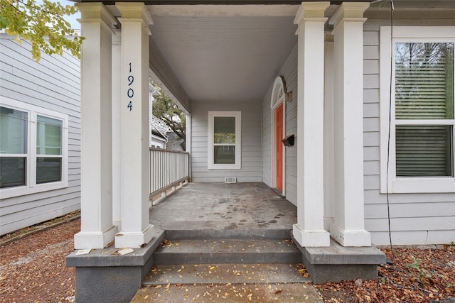 entrance to property with covered porch