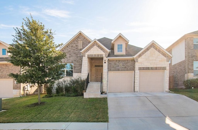 view of front of property with a front lawn and a garage